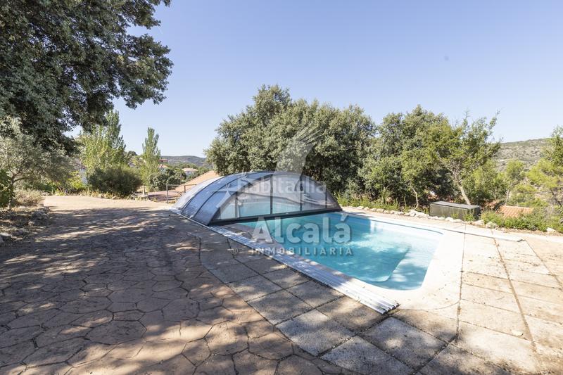 Foto eee8479c-4b27-4574-ae38-5b556059db0d. Casa exclusivo chalet independiente madrid en Ambite