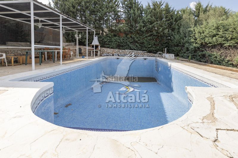 Foto 2a5b6e43-c1fa-442b-b294-d670571a6a66. Casa amb calefacció aparcament piscina a Torrejón del Rey
