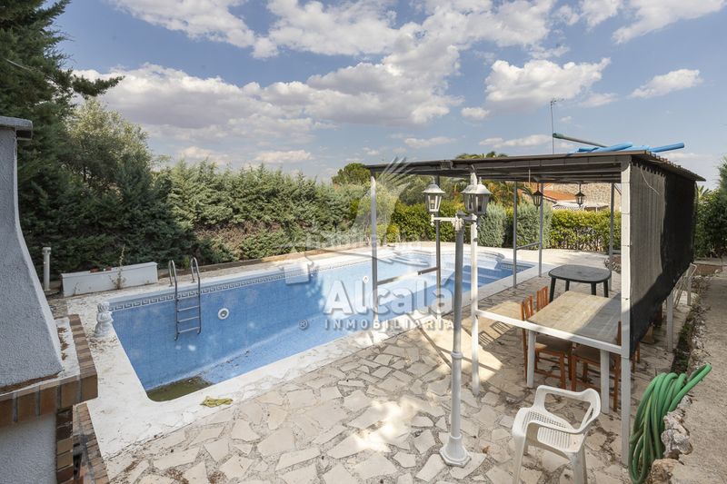 Foto 88f7efa6-e521-4f1d-be5c-ca95254386c3. Casa amb calefacció aparcament piscina a Torrejón del Rey