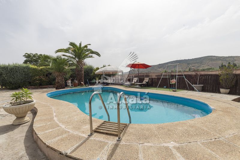 Foto f687d74e-5ca5-41f3-888b-105624c510d3. Casa amb calefacció aparcament piscina a Tielmes