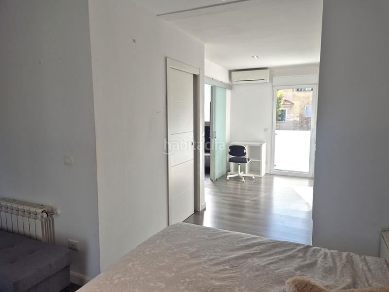 Foto 87dc1110-f758-459b-a885-8b82d9c6b2e7. Casa adossada amb calefacció aparcament piscina a Madrid