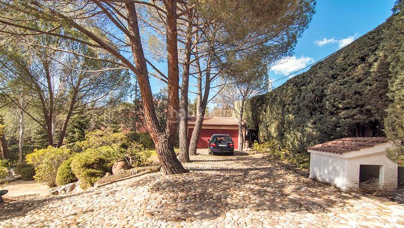 Foto 83491a42-659a-4232-b50c-9d2fb7fdfd2e. Chalet avec cheminée chauffage parking piscine dans Torrelodones
