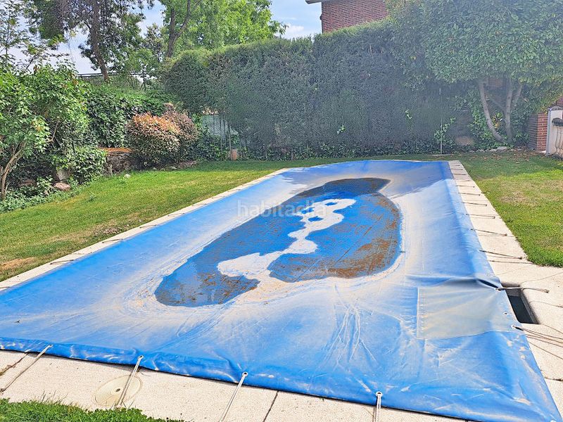 Foto 1f91bf1c-4584-42f1-af1e-62f0c467cd18. Casa aparellada amb xemeneia calefacció aparcament piscina a Torrelodones