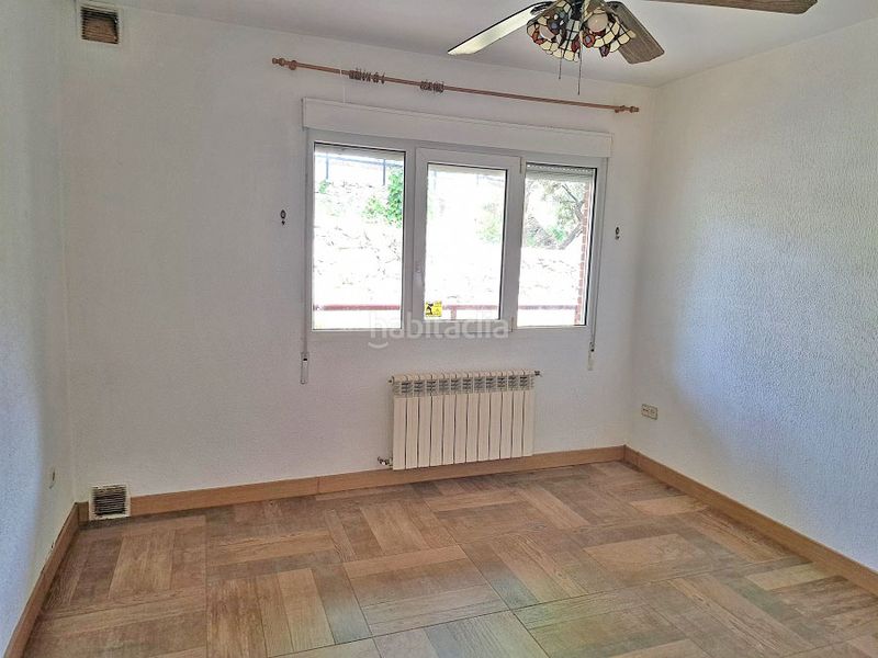 Foto 41cbda36-e31e-43c2-8fc3-318aa68e106f. Casa aparellada amb xemeneia calefacció aparcament piscina a Torrelodones