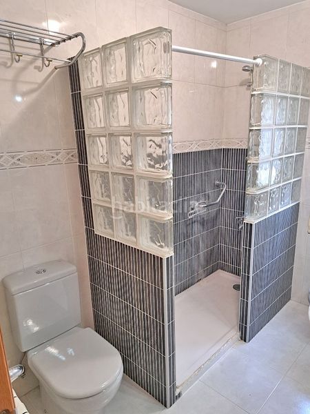 Foto 5fecac24-36f7-40c9-afce-3ad5ad89878a. Casa aparellada amb xemeneia calefacció aparcament piscina a Torrelodones