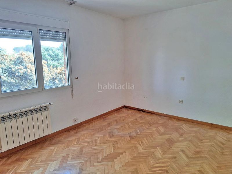 Foto 8118273d-e415-4c78-9a9b-71e7b5deb2df. Casa aparellada amb xemeneia calefacció aparcament piscina a Torrelodones