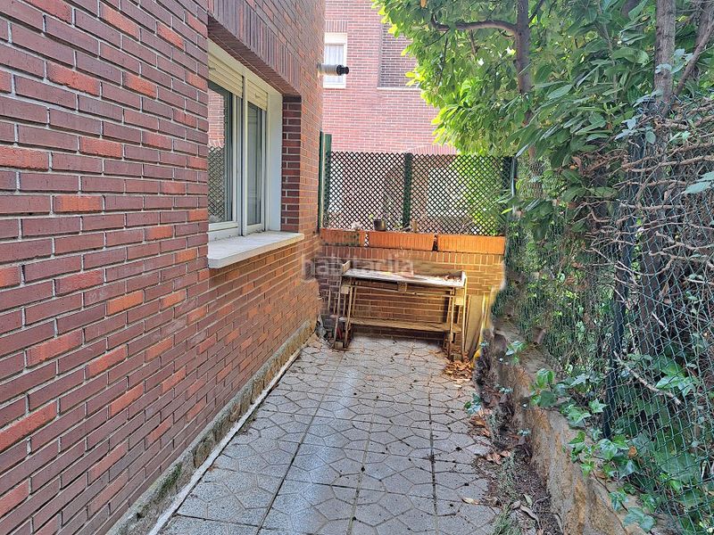 Foto 8192dfd6-1c9a-4b86-9466-001a2ae52054. Casa aparellada amb xemeneia calefacció aparcament piscina a Torrelodones