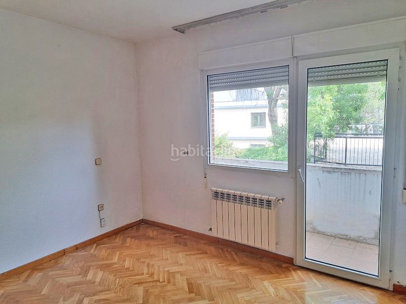 Foto 9996933c-57be-4e48-b0c4-26935badb2e1. Casa aparellada amb xemeneia calefacció aparcament piscina a Torrelodones