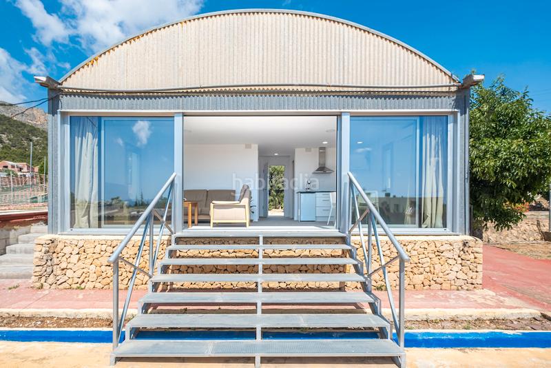 Foto 197355a7-0f3b-4a7a-8e1e-79018cca71bc. Xalet amb xemeneia calefacció aparcament piscina a Polop