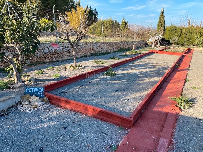 Foto 45a6bd27-2afd-4ddc-a6ce-f3a8f663691c. Xalet amb xemeneia calefacció aparcament piscina a Polop