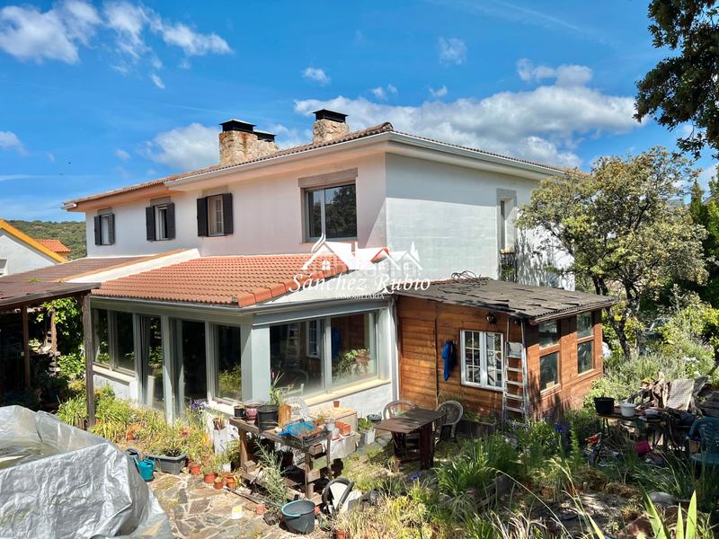 Foto 8e7c816b-add8-4b15-ad3e-a8b051ec3231. Casa aparellada a calle zarrazin 7 a Hoyo de Manzanares