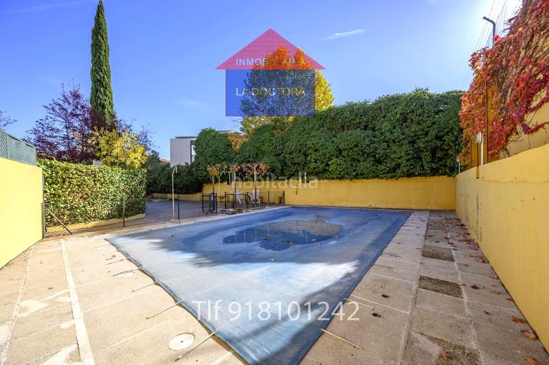 Foto 5bcb77d1-a08e-4861-a4bd-f9f4853d1e26. Maison jumelée avec chauffage piscine dans Estación Pozuelo de Alarcón