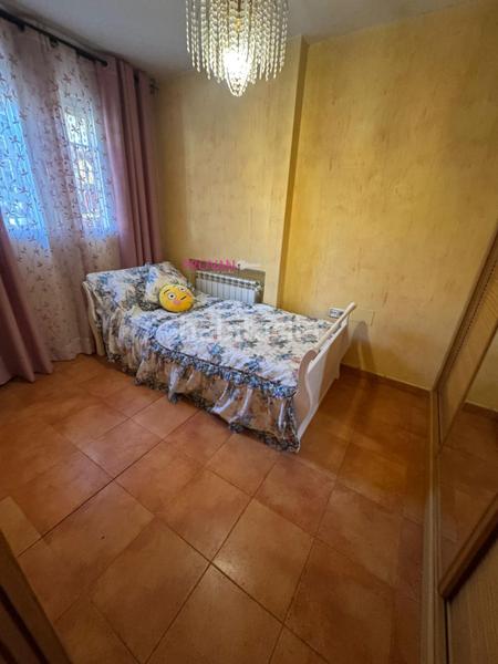 Foto 6f86be54-a6ab-4c36-80b9-e1767a0d932c. Casa amb calefacció a Virgen del Rosario Torrejón de Ardoz