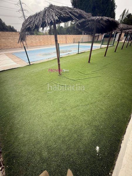 Foto 3fccdf16-8394-477e-8bb6-2c8a3dd4c1a3. Casa aparellada amb calefacció aparcament piscina a Loeches