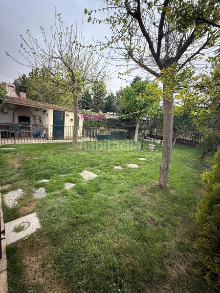 Foto c1768d1b-c0e8-42cf-af44-1a912affacdc. Casa aparellada amb calefacció aparcament piscina a Loeches