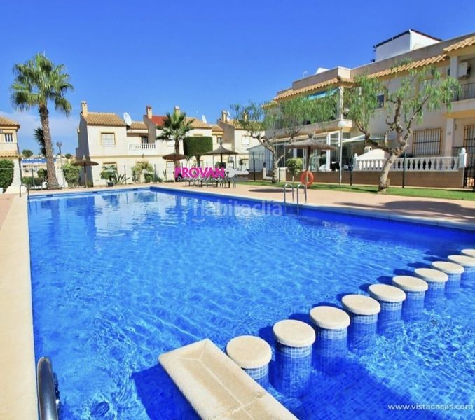 Foto 3a832b90-be44-4307-bba6-15744fb8e5a4. Casa amb aparcament piscina a Villamartín-Las Filipinas Orihuela