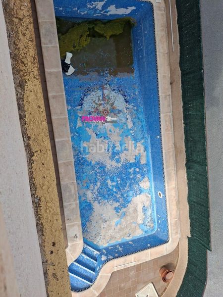 Foto 4a4c2aa9-632e-4f68-88e2-fec8fc469225. Casa amb aparcament piscina a Villamartín-Las Filipinas Orihuela