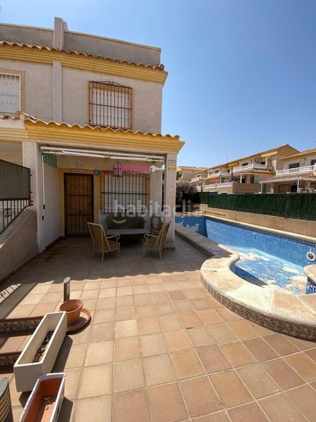 Foto d20acbbe-e113-4ced-a4e1-9e8b44283cb0. Casa amb aparcament piscina a Villamartín-Las Filipinas Orihuela