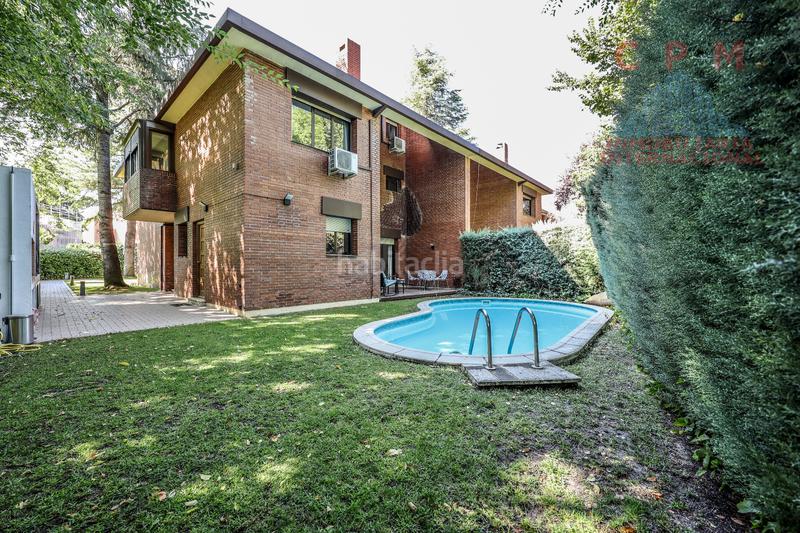 Foto 9f8bea66-2f2c-4ce0-9ee7-8e83d5dbe419. Affitto casa bifamiliare con camino riscaldamento parcheggio piscina in Pozuelo de Alarcón