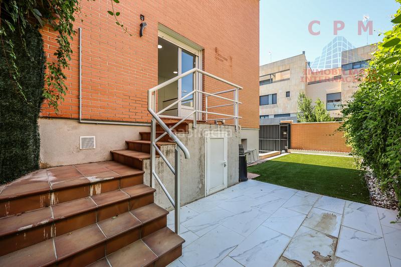 Foto 154040eb-3600-40f1-b50a-3a1dd0c1da4f. Rent semi detached house with fireplace heating parking in Madrid