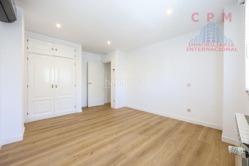 Foto 2629c0e4-0fc1-436d-abf6-7b0b0aa2cae7. Rent semi detached house with fireplace heating parking in Madrid