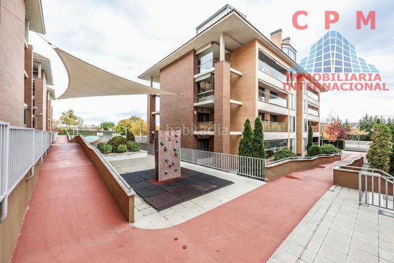 Foto c7e2a346-274b-4553-b1ac-4e1e6e28b353. Location appartement avec cheminée chauffage parking piscine dans Boadilla del Monte