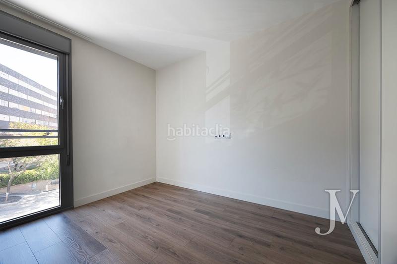 Foto ce054694-8d93-48da-8cef-0efd10714179. Piso puerta de hierro: edificio del 2015, zonas comunes, piscina, padel, gym, 3 dormitorios con 2 baños, garaje, trasetro en Madrid