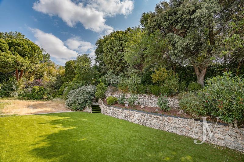 Foto d740943d-91d0-4199-bf97-47f81bfc741e. Casa adossada amb xemeneia calefacció aparcament piscina a Madrid