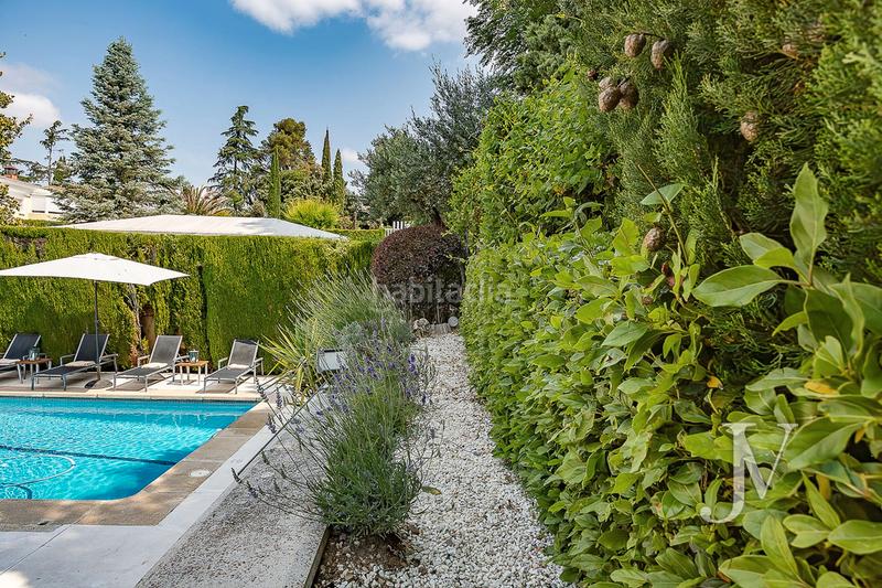 Foto ed7d7c53-8ddd-4ada-a271-b975a18454d2. Casa adossada amb xemeneia calefacció aparcament piscina a Madrid