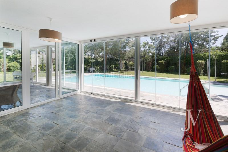 Foto 4f656a89-7878-49f4-87e2-83e01af559e2. Chalet mit heizung parking pool in urbanización La Moraleja La Moraleja