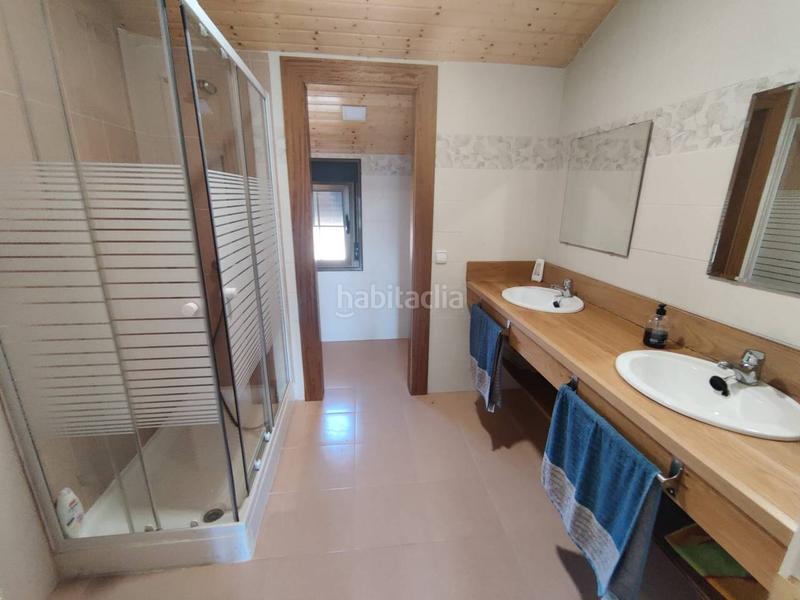 Foto 224eeb2b-8897-49ce-bee6-e2c78505a294. Xalet amb calefacció aparcament piscina a Redueña