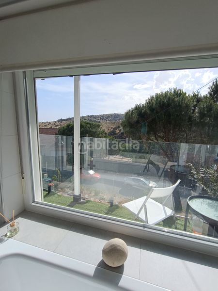 Foto be6db4c3-3914-44ce-ad78-505f5119c3db. Xalet amb xemeneia calefacció aparcament piscina a Galapagar