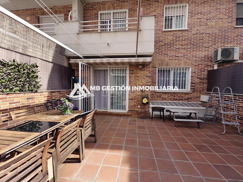 Foto af919b1b-2802-4601-9ba2-028c2451d9ab. Casa a schiera con riscaldamento piscina in La Serna Fuenlabrada