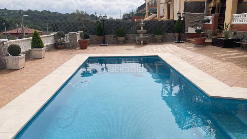 Foto de78cd6a-615e-4a77-b75c-466195fc4d1b. Xalet amb xemeneia calefacció aparcament piscina a Rubí