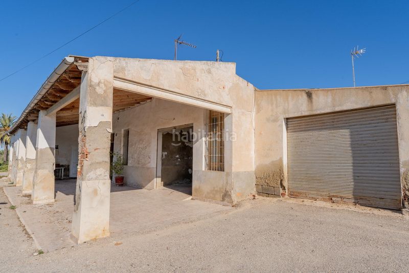 Foto bfc44a8a-142d-4f2e-9cf3-b0f82413275a. Casa amb aparcament a Algorós - El Derramador Elche / Elx