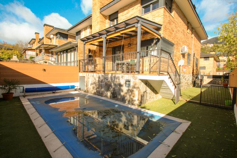 Foto 6685fb40-7439-4249-8a05-e629bf91ff38. Xalet amb xemeneia calefacció aparcament piscina a Mataelpino