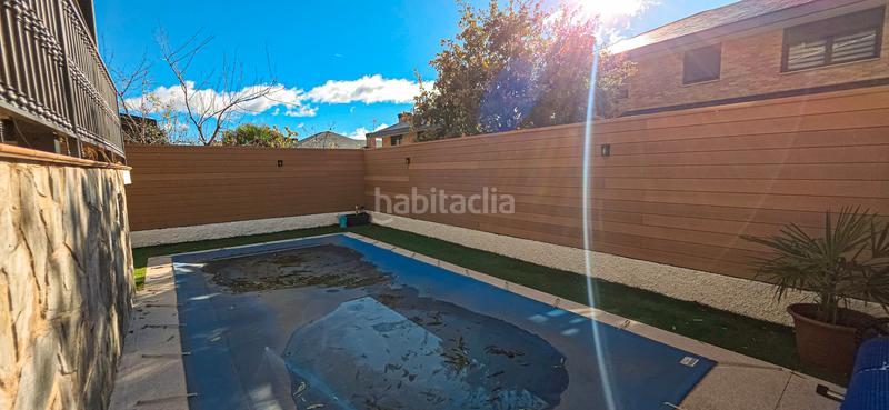 Foto c1d92dce-8502-4b6b-8d61-6d5bc022dbf1. Xalet amb xemeneia calefacció aparcament piscina a Mataelpino