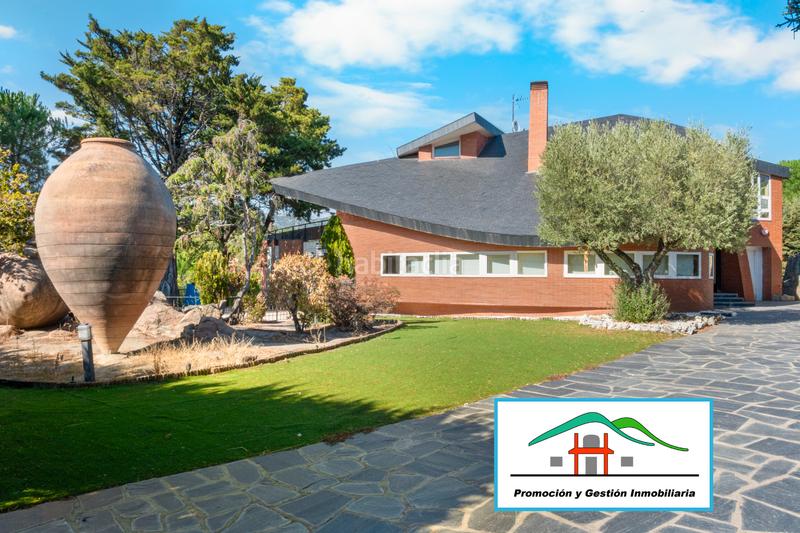 Foto 029d5c70-767e-4435-bfdd-ea4a8972fcb2. Chalet in calle el berzalejo 15 in Hoyo de Manzanares