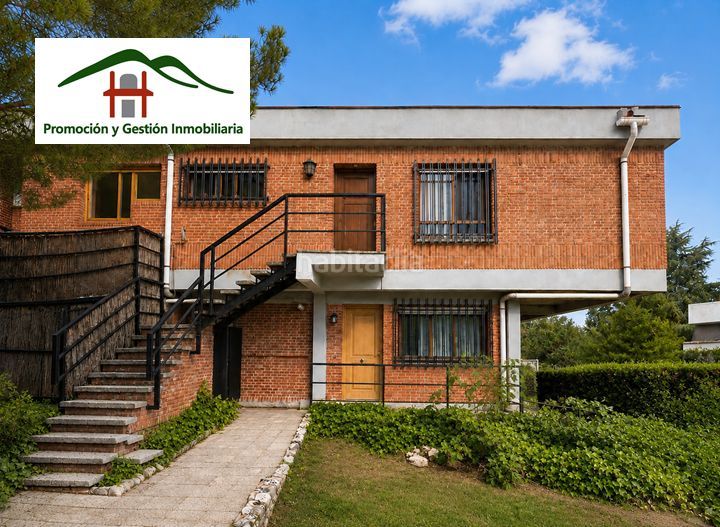 Foto 497ac961-7397-48b3-8402-7f6b786da404. Casa aparellada a calle del arra 54 a Hoyo de Manzanares