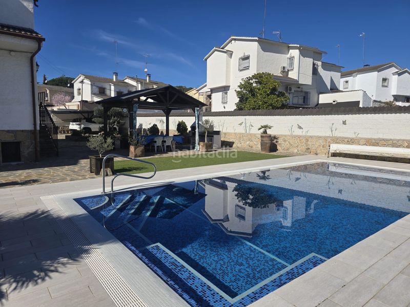 Foto 2f2e256f-f60b-49b7-8045-c5202786a3dd. Casa aparellada amb xemeneia calefacció aparcament piscina a Villamanta