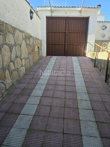 Foto 33f60717-f5b5-4f84-a13b-126ed7025407. Casa aparellada amb xemeneia calefacció aparcament piscina a Villamanta