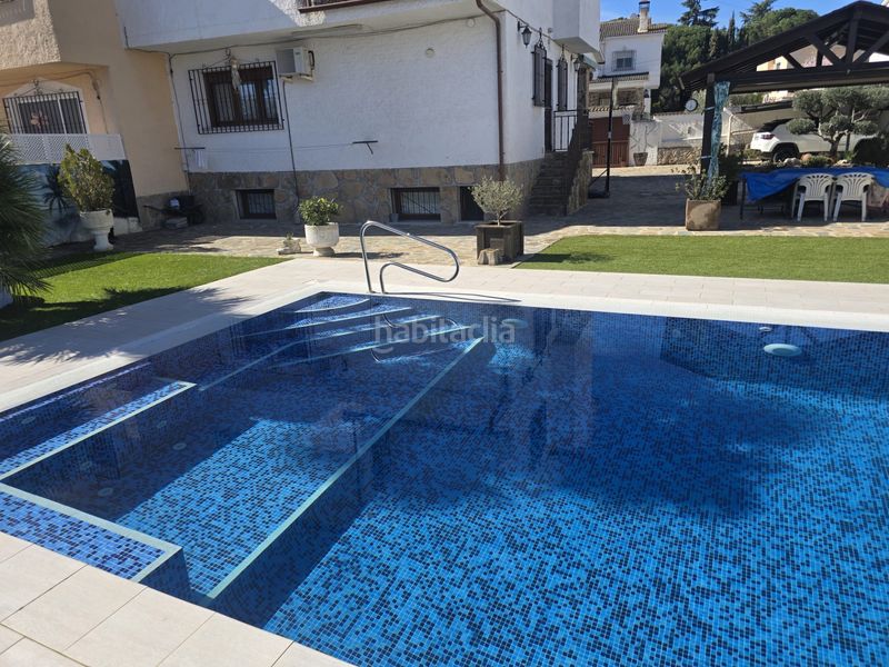 Foto 441d1388-b826-4123-a151-efd86535f350. Casa aparellada amb xemeneia calefacció aparcament piscina a Villamanta
