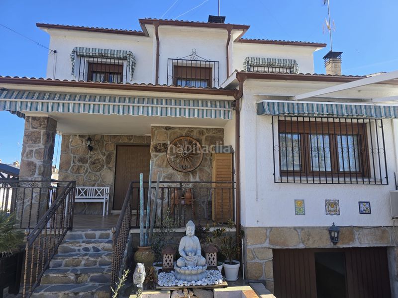 Foto 728d7bbb-bd5e-4612-87d2-09187349ef47. Casa aparellada amb xemeneia calefacció aparcament piscina a Villamanta