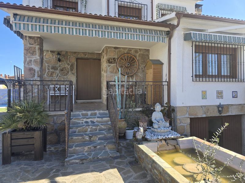 Foto 88fcf786-dc08-46f8-a606-2e6362d0fa22. Casa aparellada amb xemeneia calefacció aparcament piscina a Villamanta