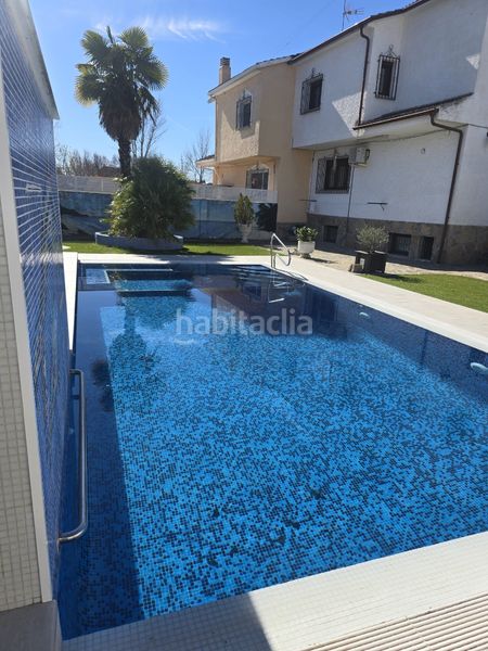 Foto 8e66bcef-0506-41e3-ab1a-8201805feafa. Casa aparellada amb xemeneia calefacció aparcament piscina a Villamanta