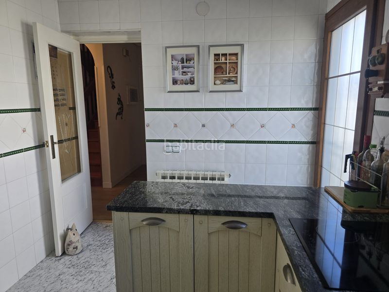 Foto a8489e3f-cf5d-4b49-af60-c099c1ee8242. Casa aparellada amb xemeneia calefacció aparcament piscina a Villamanta