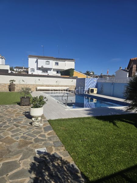 Foto f1e3c792-a5dd-4def-875a-5791aefeb3c7. Casa aparellada amb xemeneia calefacció aparcament piscina a Villamanta