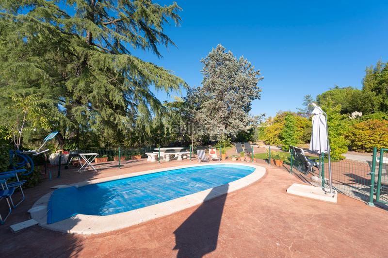 Foto 0a19e576-3883-4163-ad9c-6c6a58214a19. Chalet mit kamin heizung pool in San Crispín-La Estación Consorcio Colmenar Viejo