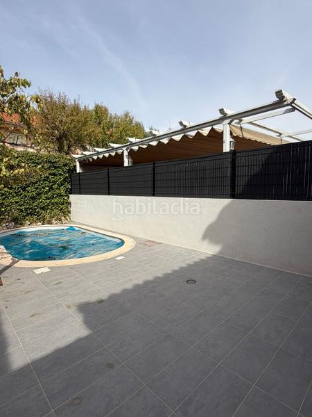 Foto 31d2e6a6-7845-41d3-97af-652e99ffab08. Casa adossada amb calefacció piscina a Hispanoamérica-Comunidades Valdemoro