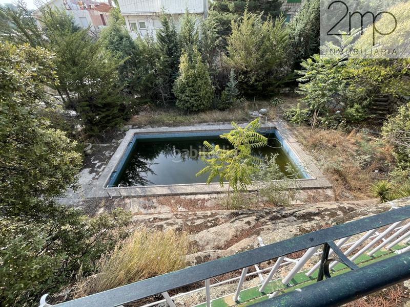 Foto 114a5f44-854f-4802-8aee-ee2ba90cb7c2. Chalet con piscina in Manzanares el Real